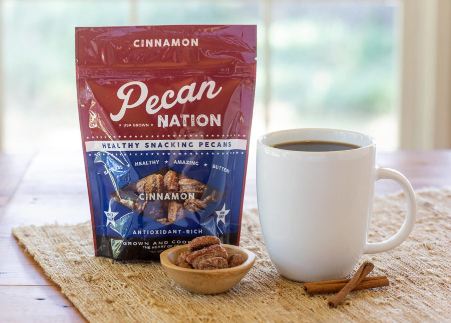bag of cinnamon flavored pecans and a cup of coffee