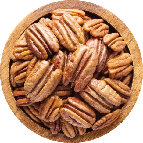 Wooden Bowl Overflowing with Pecans