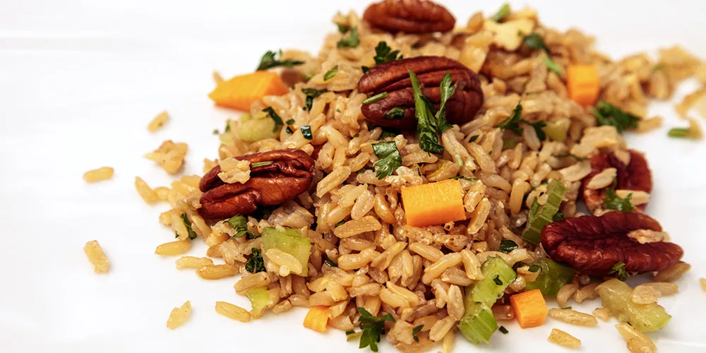 Golden toasted pecan rice pilaf with celery carrots and pecans